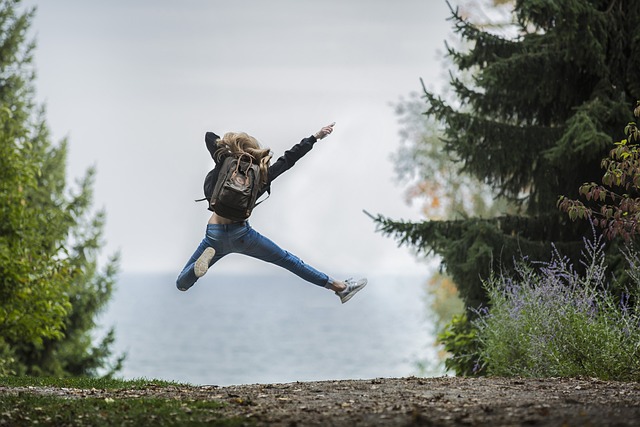 Woman happy after reaching her goals after life coaching